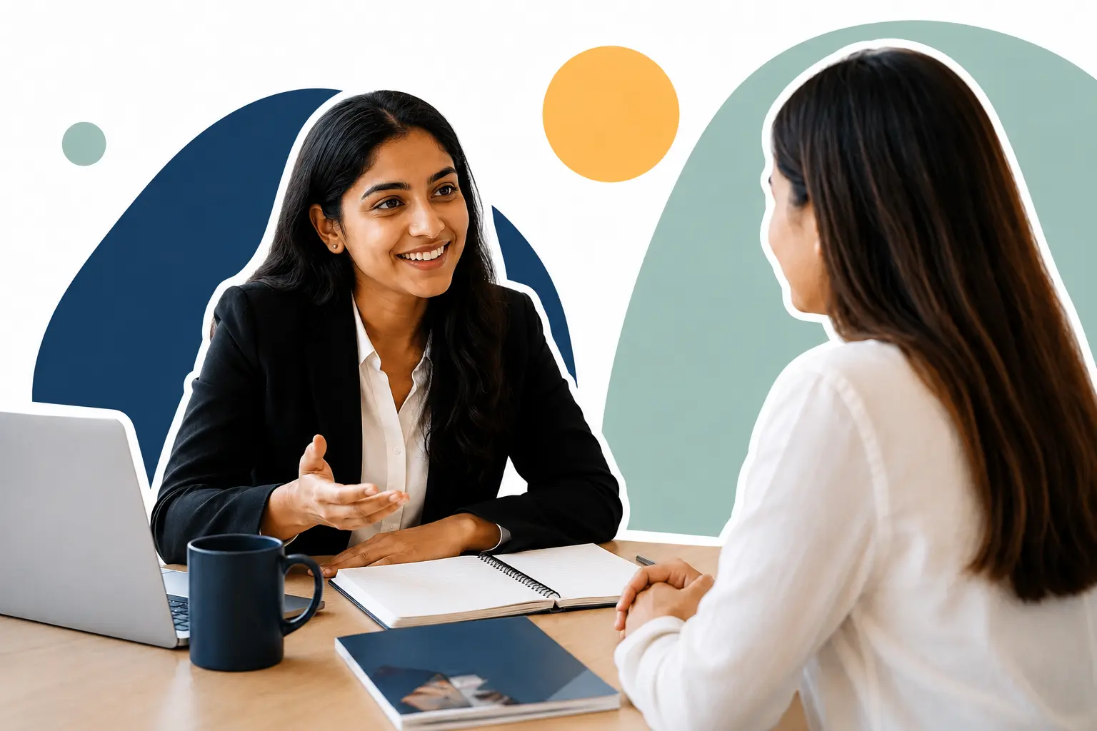 Graduate discussing her career journey with a supportive adviser